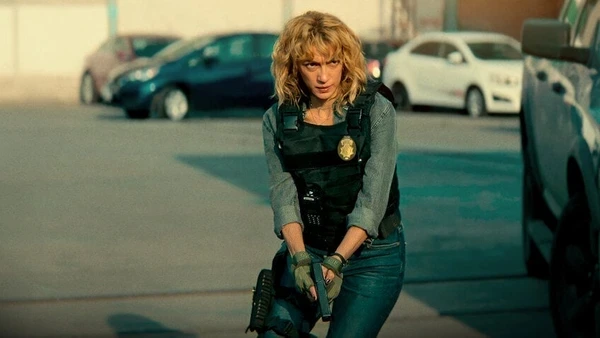 A female officer in action scene from Acapulco Shore.